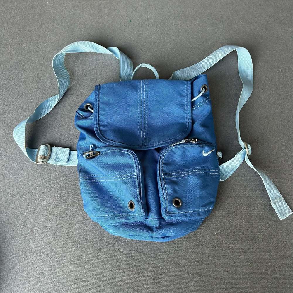 Vintage Nike Mini Y2K Backpack with adjustable straps, blue